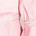 Pink ruffle blouse